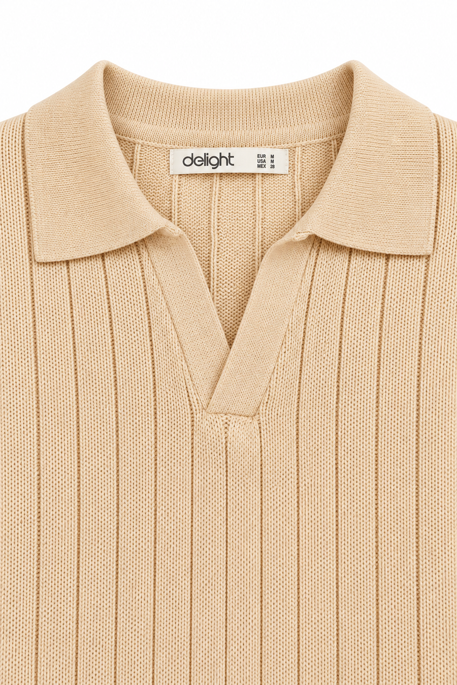 Close-up of sand beige knitted polo showing the buttonless open collar and vertical knit texture