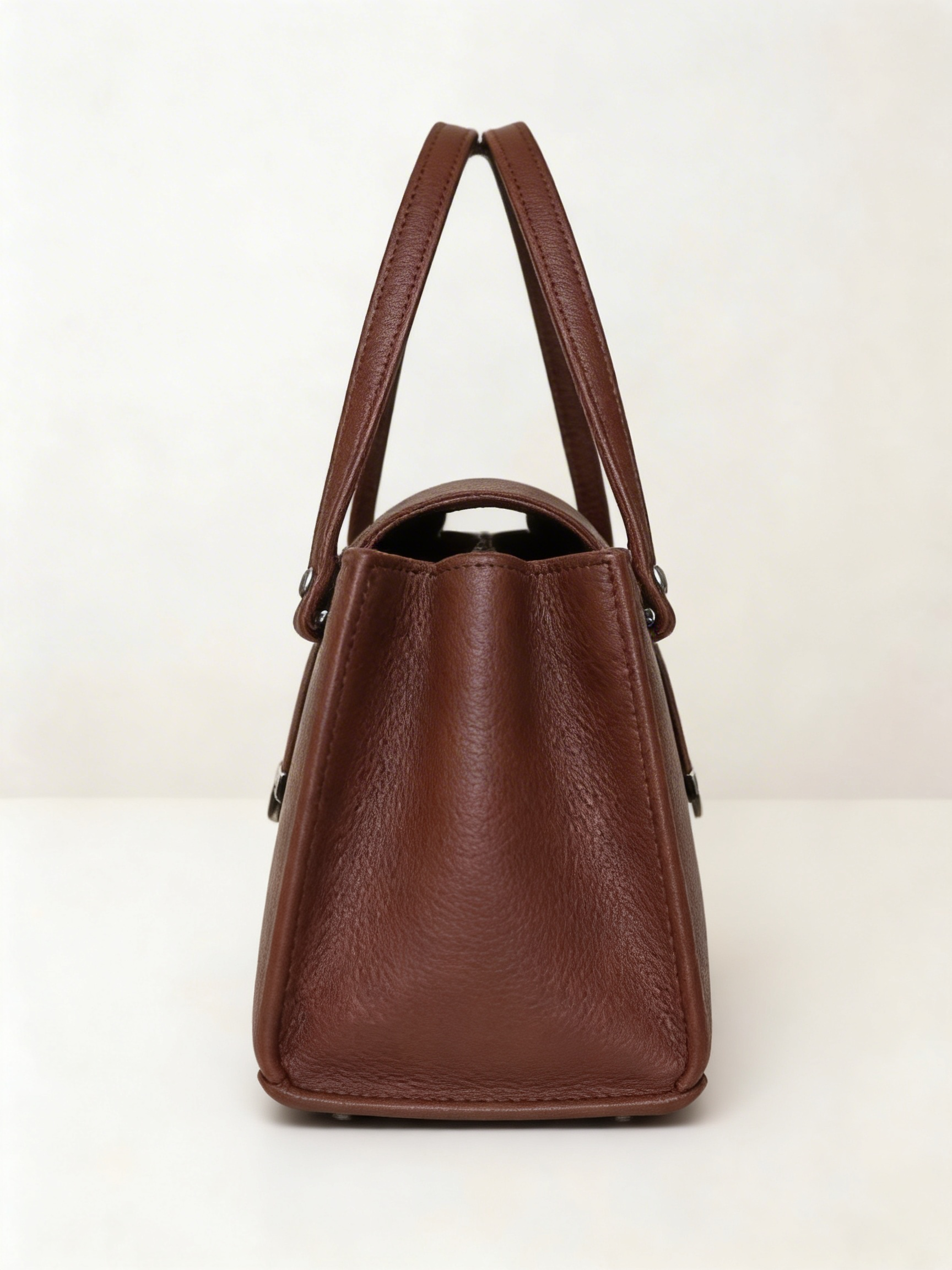 Apex Structured Lock Handbag
